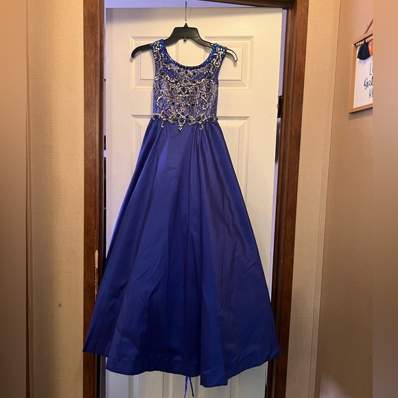 Girls pageant dress. Worn once and been in bag ever since.